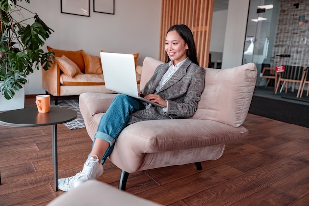 Asian woman working in IT office