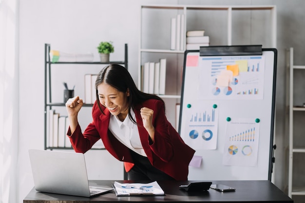 Asian women are stressed while working on laptop Tired asian businesswoman with headache at office feeling sick at work copy space