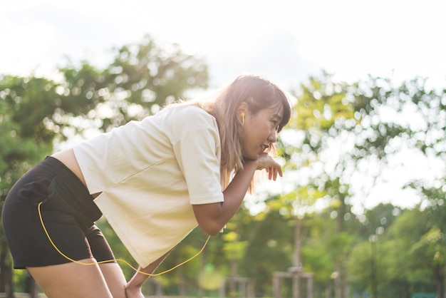 Asian women athletes with a white shirt