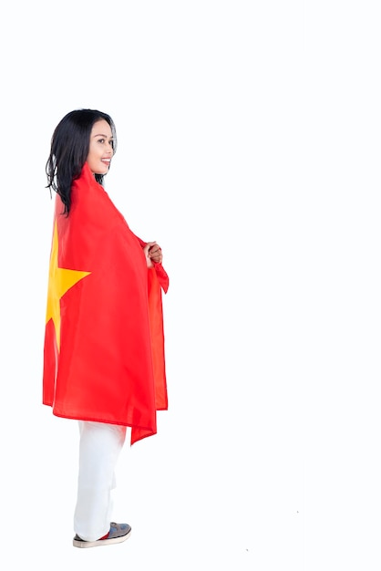 Asian women celebrate Vietnam independence day on 02 September by holding the Vietnam flag