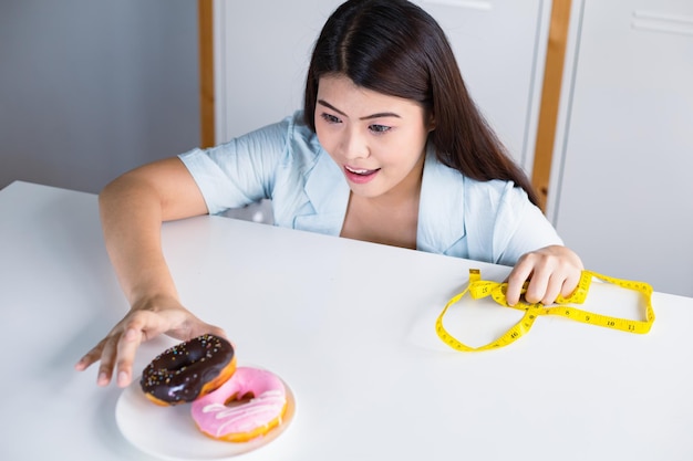 Asian women have a craving for delicious donuts