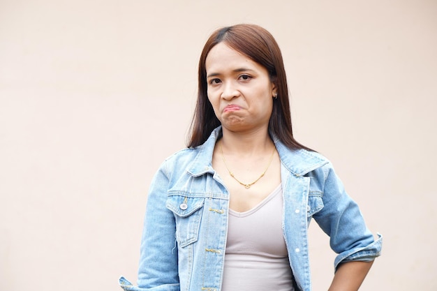 Asian women look unhappy stressed out of work