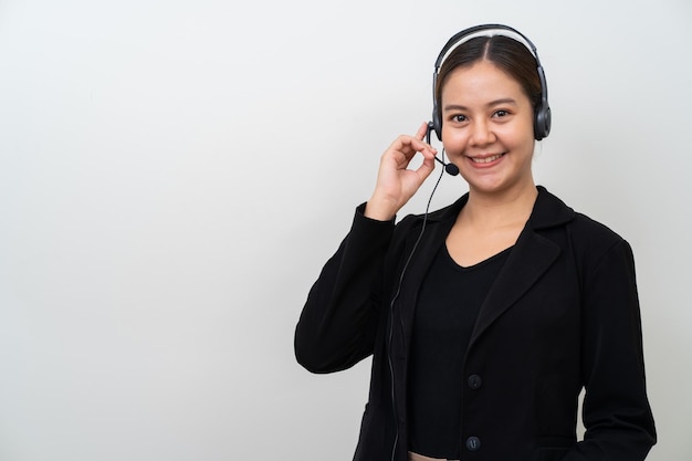 Asian women opeator with headphone on white background