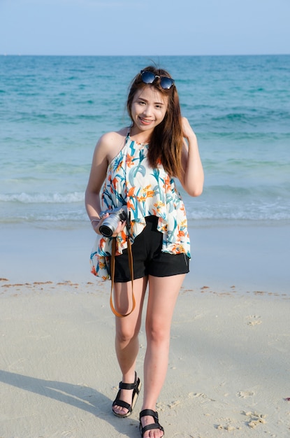 Asian women portrait hold camera and touch her hair