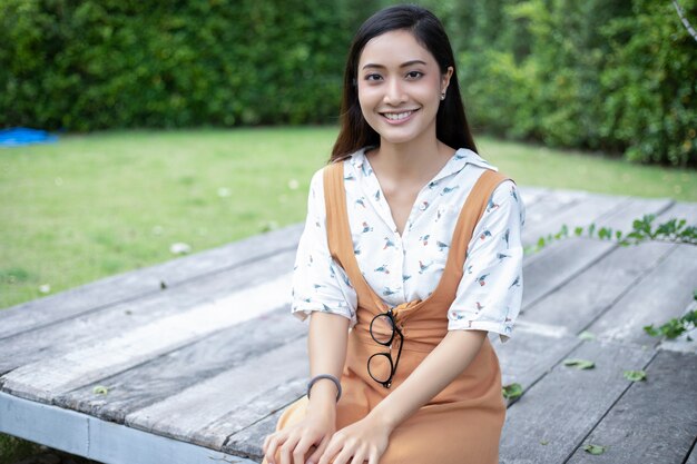 Asian women smiling and happy Relaxing time at outdoor