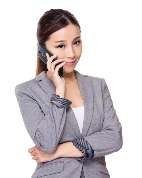 Asian Young businesswoman chat on mobile phone