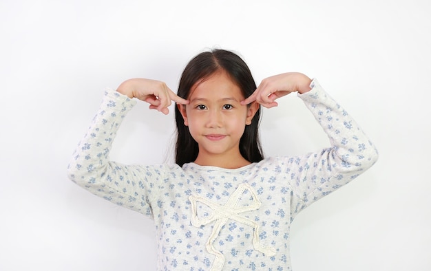 Asian young girl kid think gesture with index finger point brain head for new idea and imagination or creativity education isolated on white background