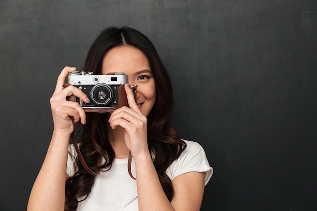 Asian young happy woman photographer