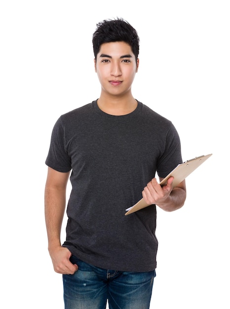 Asian young man hold with clipboard