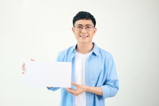 Asian young man showing pannel isolated on white background