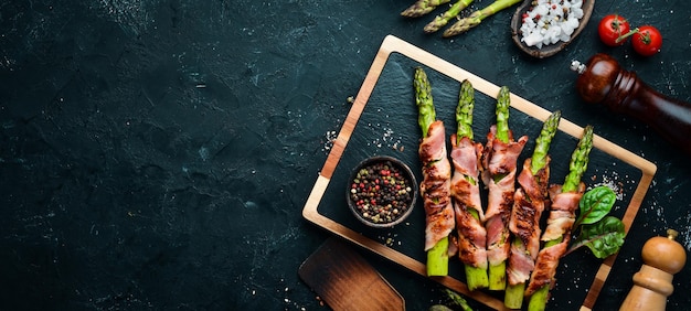 Asparagus baked with bacon and spices Healthy food Top view Free space for your text