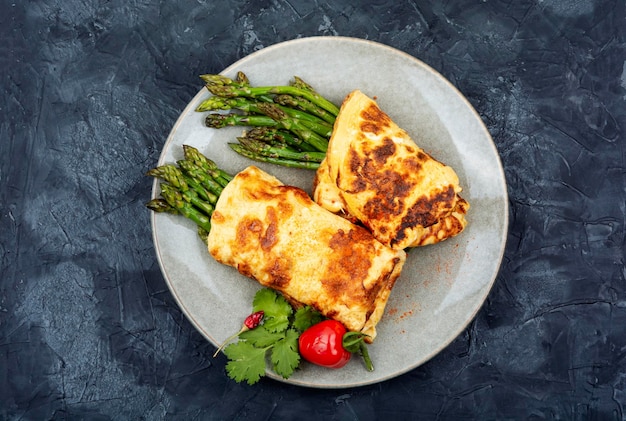 Asparagus in an omelet Italian cuisine