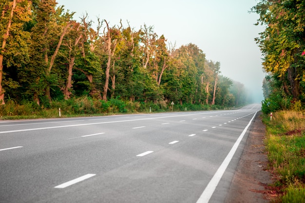 Asphalt highways and mountains under the blue sky