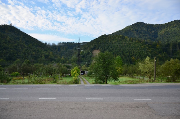 Asphalt road in the mountainous terrain in the morning