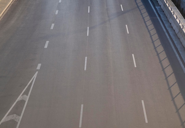 Asphalt road with dividing lines Top view highway background