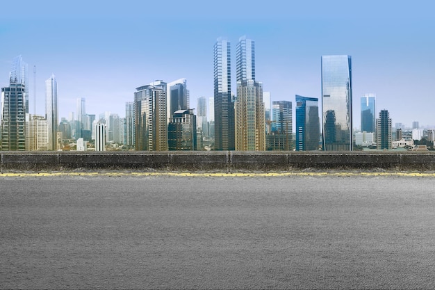 Asphalt road with modern building and skyscrapers on the midtown