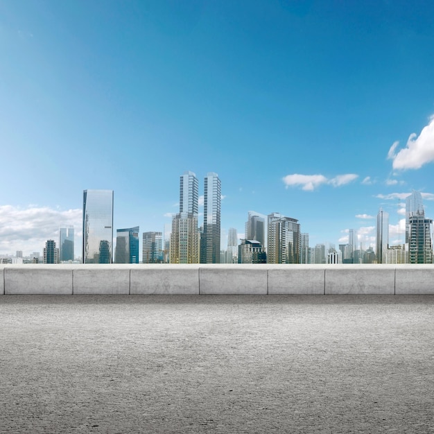 Asphalt road with modern building and skyscrapers