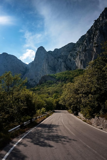 Asphalted road in the mountains beautiful sunshine summer vacation time