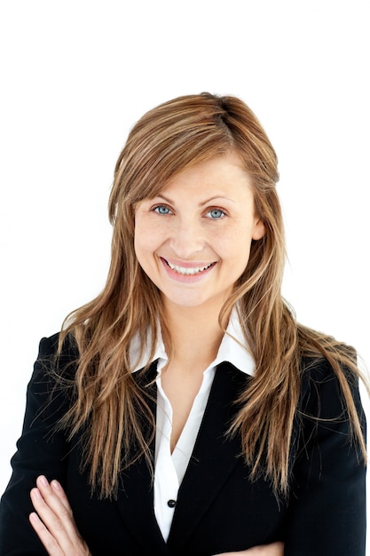 Assertive businesswoman with folded arms smiling at the camera 