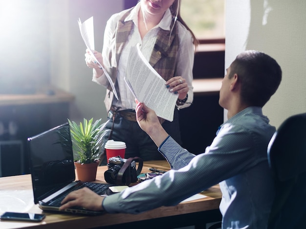 Assistant manager secretary business working routine help assistance planning man and woman coworkers negotiating office workspace