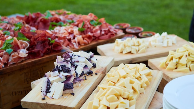 Assorted cheeses in various shapes and sizes