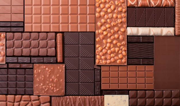 Assorted chocolates, various cocoa bar. Organic food background.