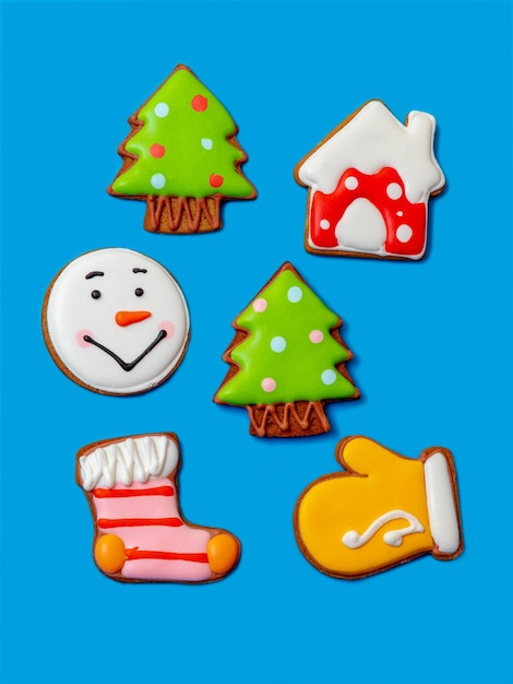 Assorted Christmas cookies on a blue background