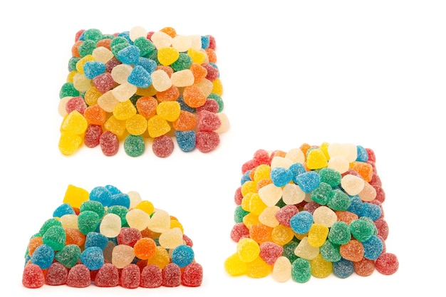 Assorted colorful gummy candies isolated on a white background