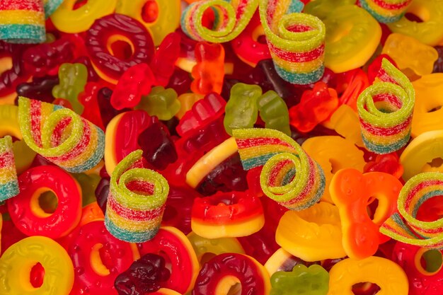 Assorted colorful gummy candies Top view Jelly donuts