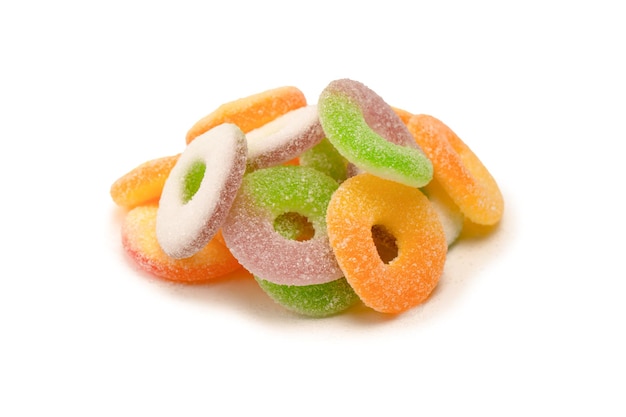 Assorted gummy candies isolated on a white background Top view