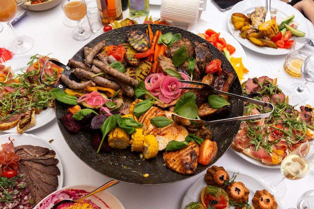 Assorted meat and vegetables fried in a wok