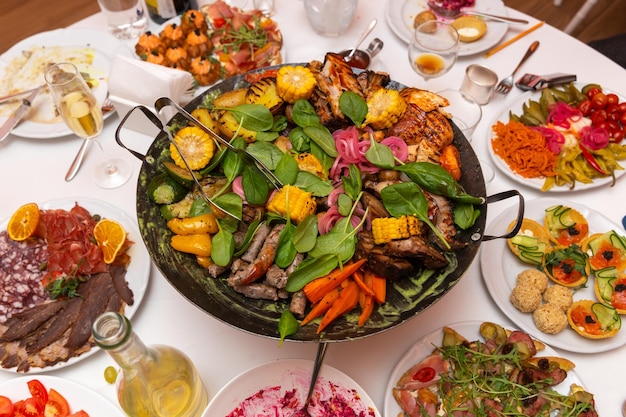 Assorted meat and vegetables fried in a wok