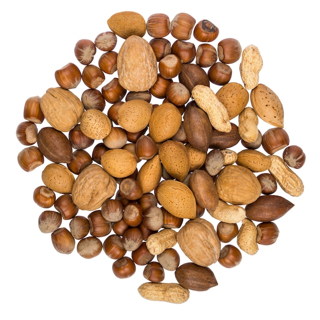 Assorted mix of nuts in shells arranged in a circle