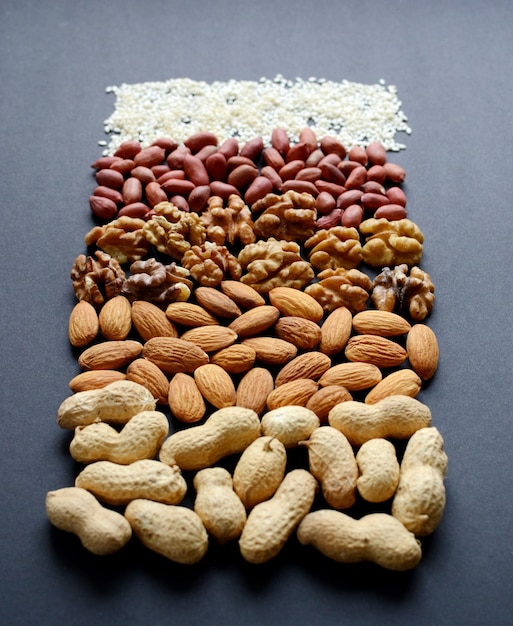 Assorted mixed nuts, peanuts, almonds, walnuts, pistachios, pecan, cashew, hazelnuts.