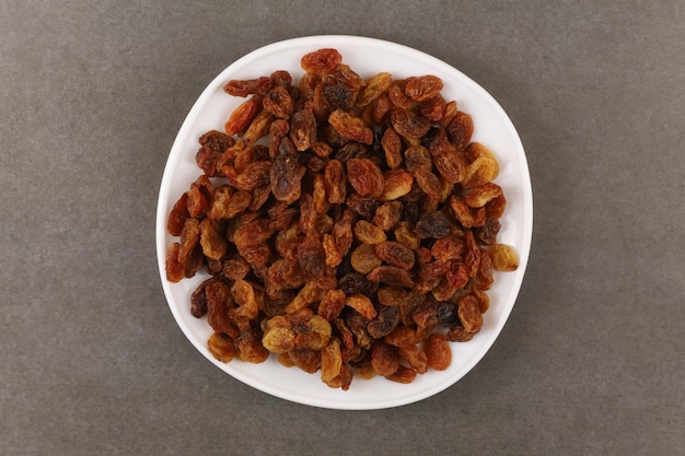 Assorted Raisins Top View in White Bowl