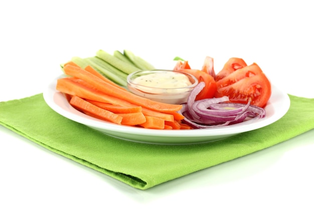 Assorted raw vegetables sticks in plate isolated on white