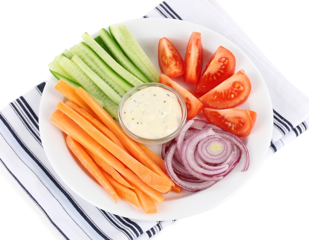 Assorted raw vegetables sticks in plate isolated on white