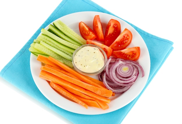 Assorted raw vegetables sticks in plate isolated on white