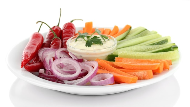 Assorted raw vegetables sticks in plate isolated on white