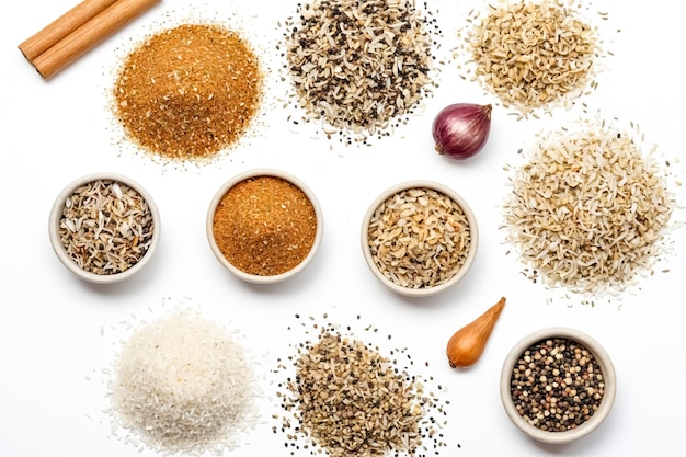 Assorted Spices and Grains on White Background