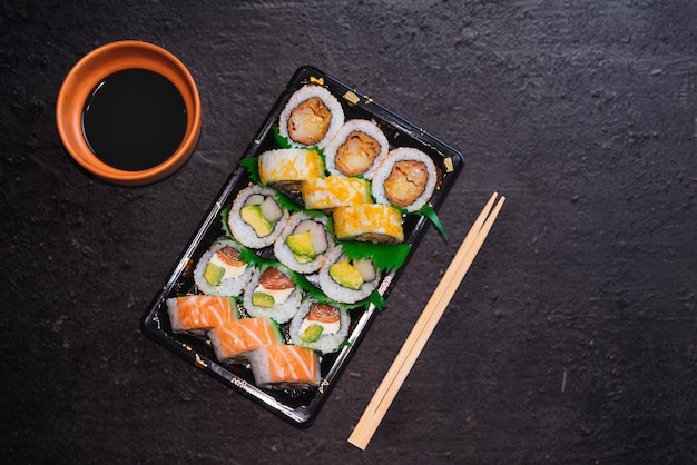 Assorted sushi platter chopsticks and soy sauce