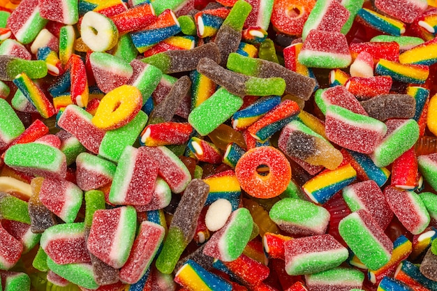 Assorted tasty gummy candies. Top view. Jelly  sweets background.