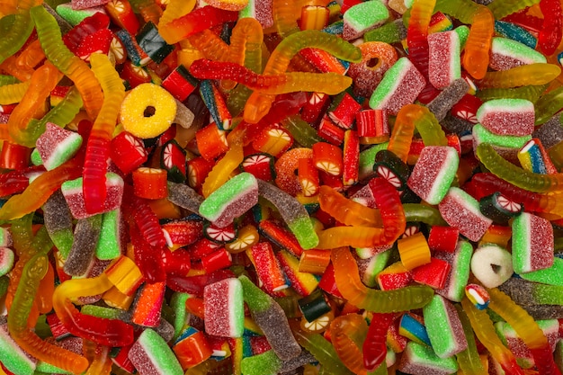 Assorted tasty gummy candies. Top view. Jelly  sweets background.