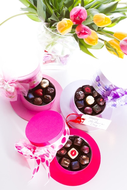 Assorted truffles in cute hat shape boxes for Mothers Day.