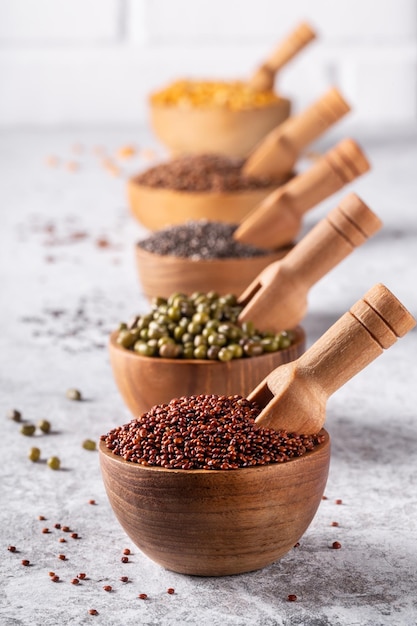 Assortment of beans seeds legumes on white background