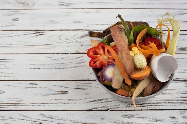 Assortment of compost made of rotten food with copy space