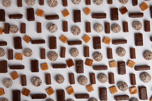 Assortment of delicious chocolate candies background