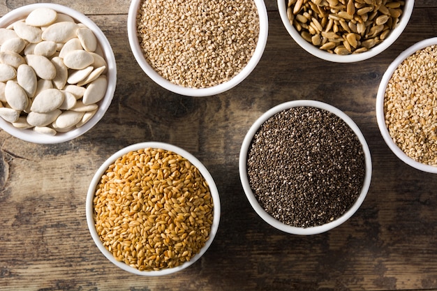 Assortment of different seeds in bowls