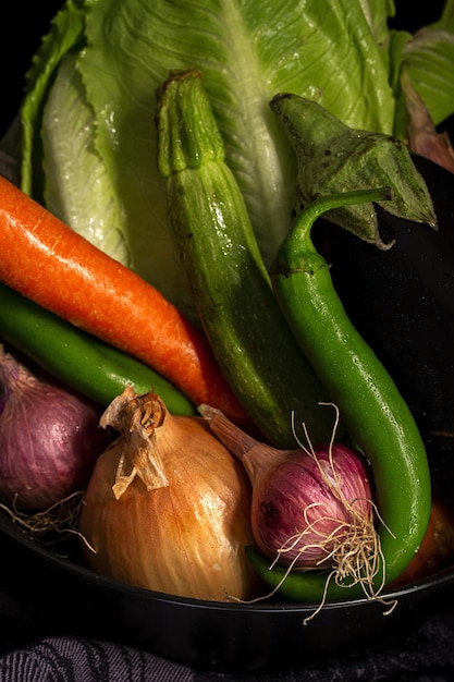 Assortment of fresh vegetables with dark background