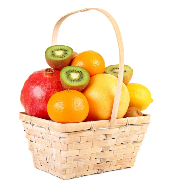 Assortment of fruits in basket isolated on white